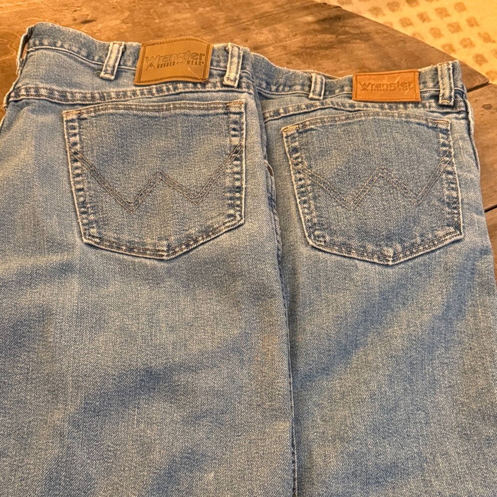 2 pair very good condition 38x30 each Wrangler Men's 5 pocket Rugged Wear Jeans